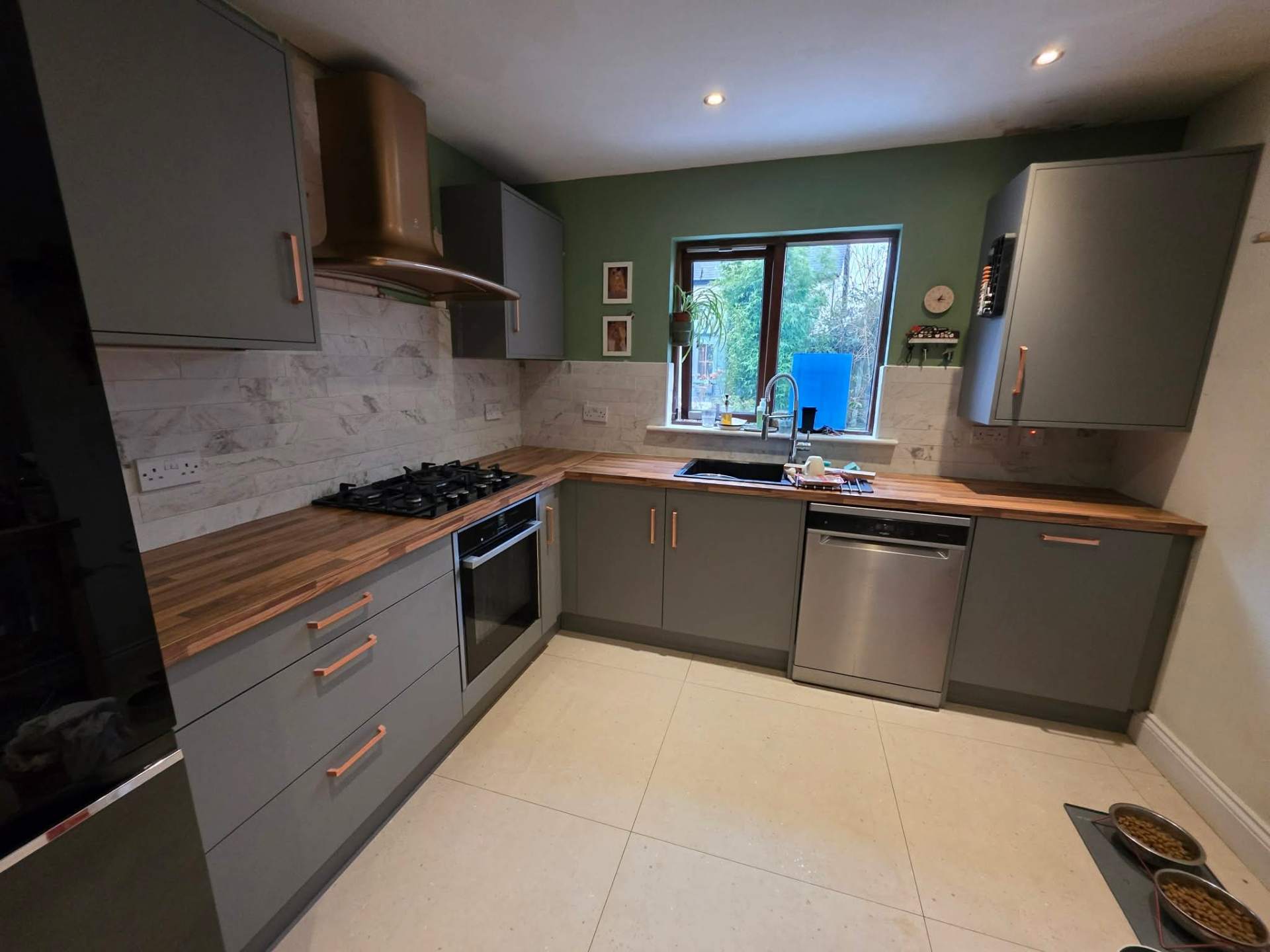 Handyman fitting herringbone flooring in a Dublin home