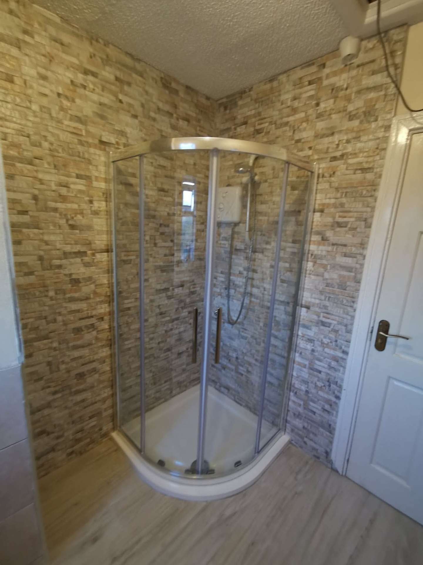 Stone-effect shower — Handyman Dublin